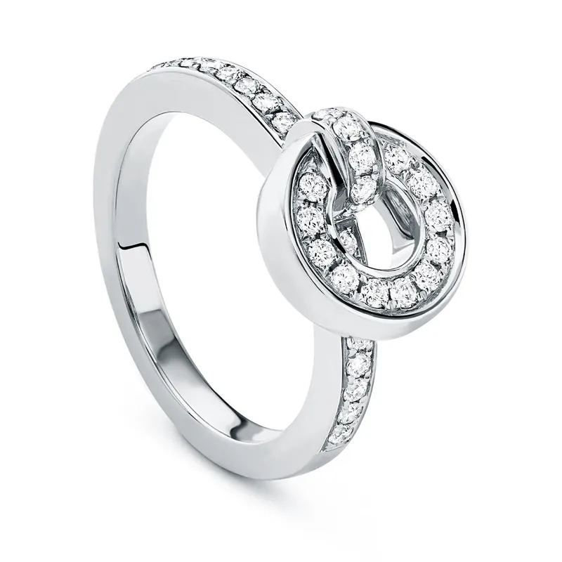 Roulette flip ring in white gold: a small circle of diamonds held upright on a pavé diamond band