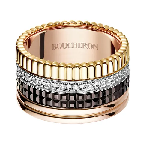 Quatre Classique large ring: four joined bands in yellow gold, rose gold, white gold set with a row of diamonds, and dark brown PVD, on a white ground.