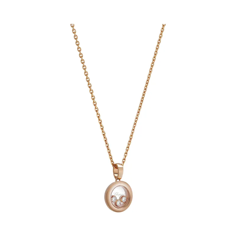 Happy Diamonds Icons pendant in rose gold on a chain: a round glass-fronted locket with three loose diamonds inside, on a white ground.