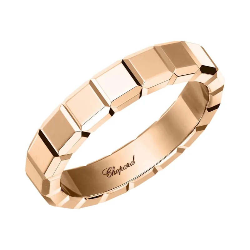 Ice Cube ring in rose gold, a band of small polished cubes with chamfered corners, on a white ground.