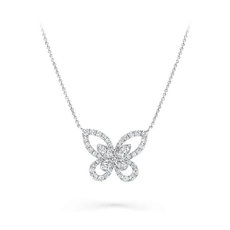 Butterfly Silhouette pendant: an open butterfly outline in pavé diamonds with a small diamond butterfly at its centre, on a white gold chain