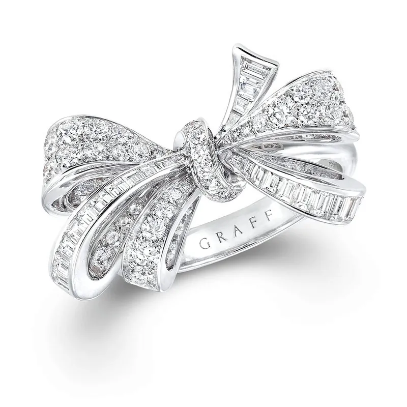 Tilda's Bow Classic ring: a tied bow of round and baguette diamonds in white gold
